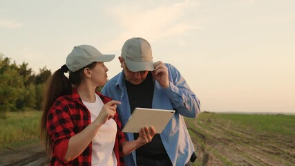 two farmers working tablets, field group conversations, group transactional teamwork, agricultural business, farming agronomy, planning greeting horizon group owner senior ecology persons, specialist