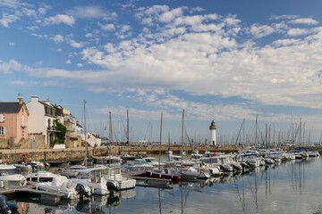Fototapeta premium Port Maria lighthouse dominating Quiberon harbor in Brittany, France