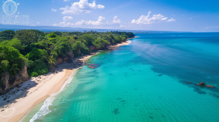 Obraz premium Turquoise waves meet white sand under sunlight, a serene tropical coastline blending sea and sky.