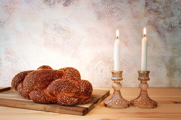 Image of Shabbat, challah bread, wine and candles