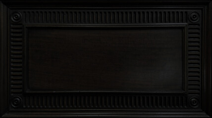 Elegant Dark Wood Panel with Ornate Classical Frame. Wood Texture Background with copy-space.