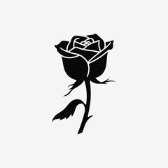 Minimalist Black Rose Silhouette on White Background – Elegant High-Contrast Floral Design