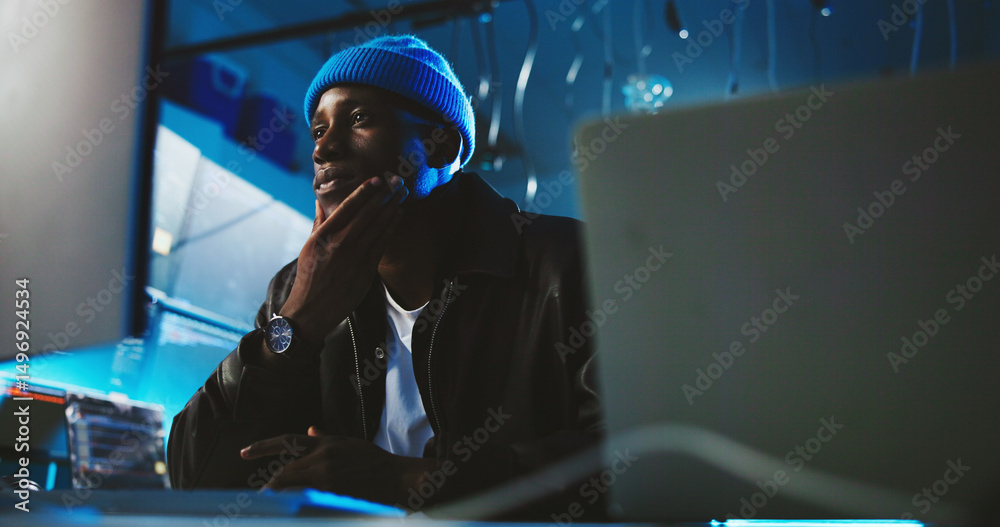 Leinwandbilder black man, hacker and thinking with computer at night for programming, cyber attack and virus decisi