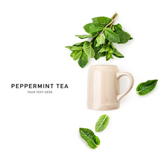 Mint leaves herbal tea and ceramic mug photography isolated on white background.