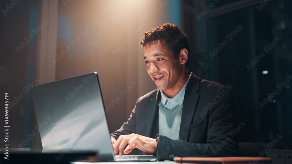 Poster businessman, smile and typing with laptop, night and project management deadline and strategy report