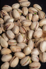 Pile of fresh and tasty pistachios