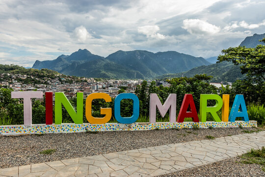 Text TINGO MARIA at Cruz de San Cristobal viewpoint over Tingo Maria town with Bella Durmiente (Sleeping Beauty) mountain, Peru