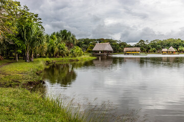 Fototapeta premium Huts at Laguna de los Milagros lake near Tingo Maria city, Peru