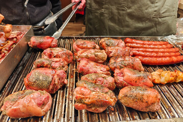 Large assortment of grilled sausages and kebabs at  Cracow christmas market