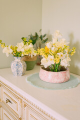 Elegant Floral Arrangement in White Vase Elegant in Pastel Tones