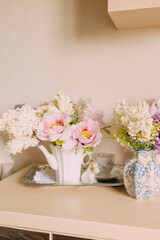 Elegant Floral Arrangement in White Vase Elegant in Pastel Tones
