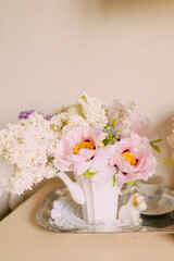 Elegant Floral Arrangement in White Vase Elegant in Pastel Tones