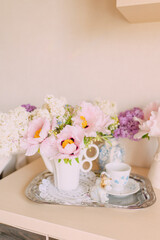 Elegant Floral Tea Party with Vintage Charm