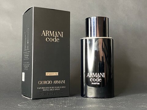 Palmanova, Spain - May 20, 2025: Armani Code perfume bottle displayed with elegant packaging, showcasing luxury fragrance design and branding for sophisticated consumers