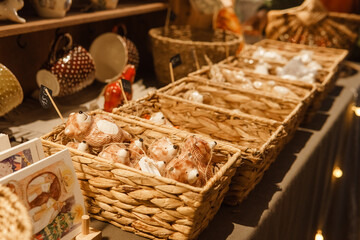 Sale of handmade ceramic Christmas tree toys at the Christmas Fair. Black Friday for the winter holidays.