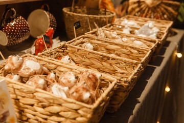 Sale of handmade ceramic Christmas tree toys at the Christmas Fair. Black Friday for the winter...
