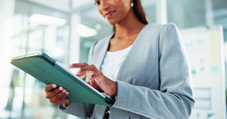 Fototapeta na wymiar Hands, typing and business woman with tablet for accounting, economy update or finance report in office. Scroll, idea and financial advisor with portfolio advice, research graphs or investment