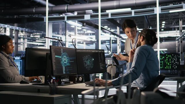 Data center admins working together, collaborating on neural network software development. Teamworking server hub colleagues implementing artificial intelligence technology in workplace, camera A