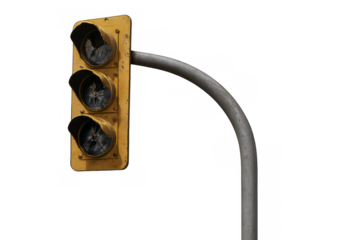 Broken traffic light hanging on metal pole with transparent background