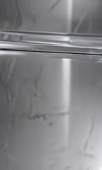 Gleaming silver surface, polished to a mirror sheen, metal, reflective texture