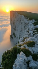 Majestic Clifftop Sunrise: A Breathtaking View Above the Clouds