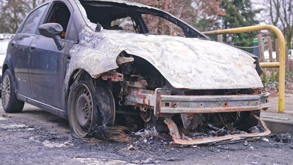 Car Wreck Burned during City Riots Set On Fire by Arson
