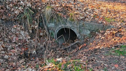 Concrete Culvert on Dried Irrigation Ditch Trench around Rural Agricultural Field