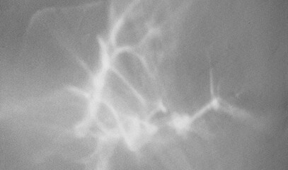 Caustic effect light refraction on white wall overlay photo mockup, blurred sun rays refracting through glass prism with shadow. Abstract natural light refraction silhouette on water surface mock up