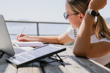 digital nomad woman working remotely Remote work, sustainability, wellness, Gen Z, conscious living, home office and online freelancing