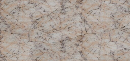 Beige marble-like surface with veining