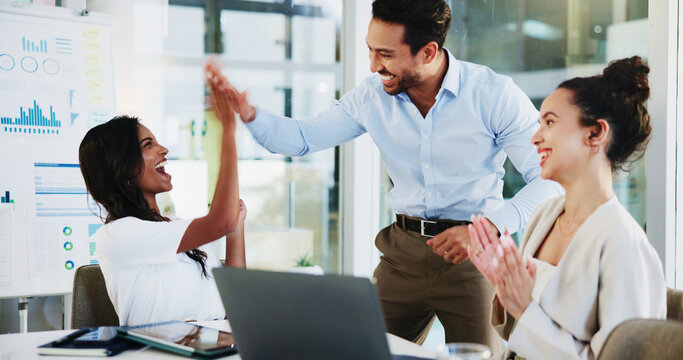 Business people, meeting or applause with high five in office for finance promotion, company success or good news. Financial team, happy or celebration for corporate recognition, support or KPI goals