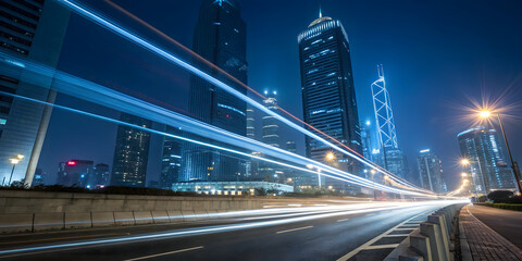 Fototapeta premium City at night: vibrant light trails streak through urban landscape, illuminating the bustling streets and creating a dynamic nocturnal scene.Urban Skyline And Light Trails Against Clear Sky At Night
