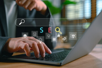 SEO and digital marketing concept with a person typing on laptop, search bar, and icons of data, optimization, and AI tools. Represents online visibility, content strategy, and smart ranking.