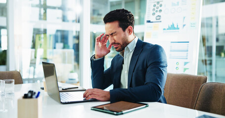 Business, man and laptop with headache in office for financial mistake, corporate burnout and...