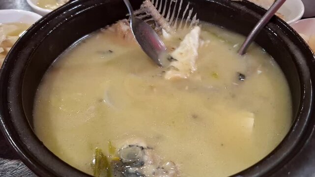 Traditional creamy fish soup is flavorful and served fresh.