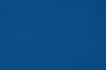 Elegant navy blue colored dark Concrete textured cool grunge abstract background with roughness and irregularities. 2020 color trend concept.