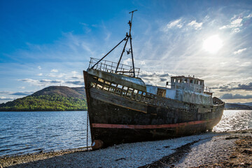 View of Corpach Wreck or Old Boat of Caol and Nevis Range Mountains, Caol Beach, Corpach, Fort...