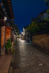 Traditional Japanese alley in Kanazawa, Ishikawa Prefecture, photographed at night with warm lighting and preserved Edo period architecture