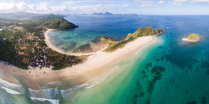 Aerial panoramic view of Nacpan beach and ocean, El Nido, Palawan, Philippines