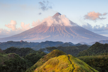 Sunset over Mayon volcano and rolling hills, Albay, Philippines