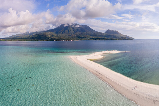Aerial view of white island sandbar and Camiguin, Philippines