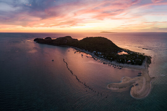 Colorful sunset over Mararison island, aerial view, Panay, Philippines