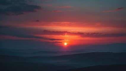 Obraz premium Sunset over the mountains at dusk with vibrant sky colors and silhouettes. Nature scenery, landscape, tranquility, beautiful evening, horizon.