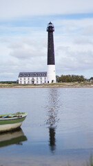 Black and white Sorve lighthouse in Torgu Parish on the island of Saaremaa, Estonia. The famous...