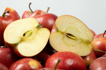 Fresh Red Apples and Halves Close-Up Composition.