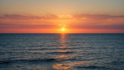 Naklejka premium Sunset over the ocean with vibrant sky and calm waters. Nature scene. Tranquility and serenity at sea.