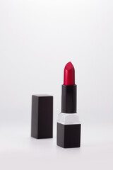 Elegant lipstick for evening makeup placed on a clean white background. Perfect for beauty, cosmetics, and skincare themes in advertising or editorial content.