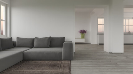 Modern living room with gray couch and minimal decor in bright space