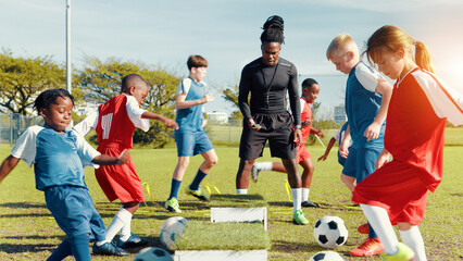Sports field, soccer player and children with ball, training and athlete with energy for practice...