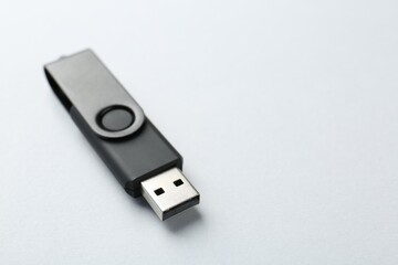 One flash drive on white background, closeup